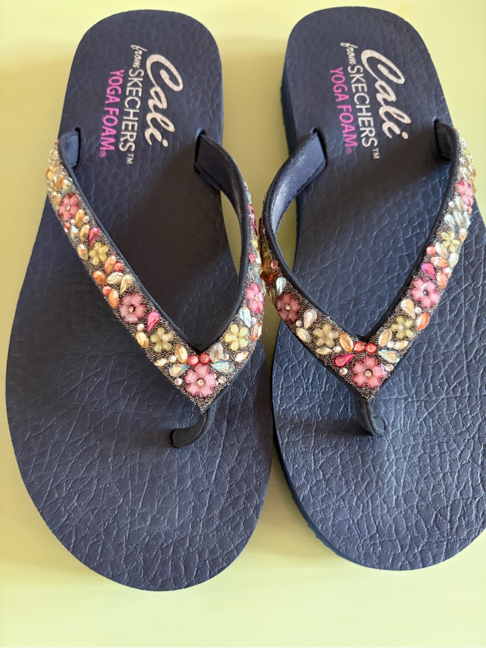 Skechers Navy cali Yoga Foam Flip Flops with Pink & Yellow Floral Gems